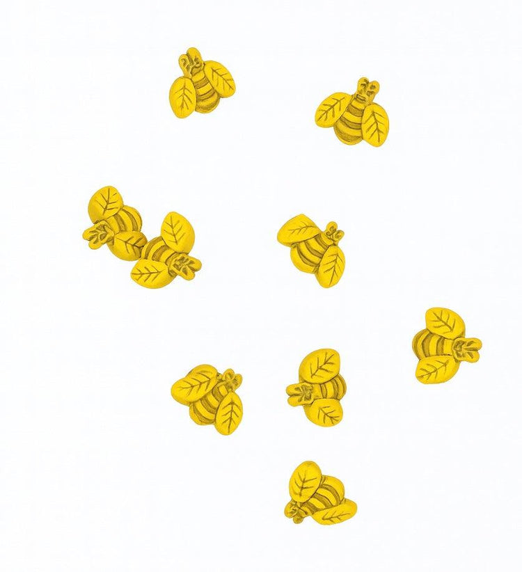 Handmade yellow bee buttons from Little Button Bees collection for unique accessories and décor.