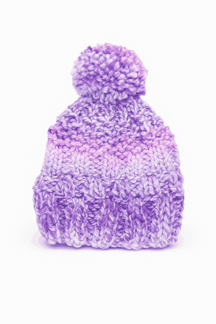 purple handmade knitted hat with pom pom and chunky knit pattern