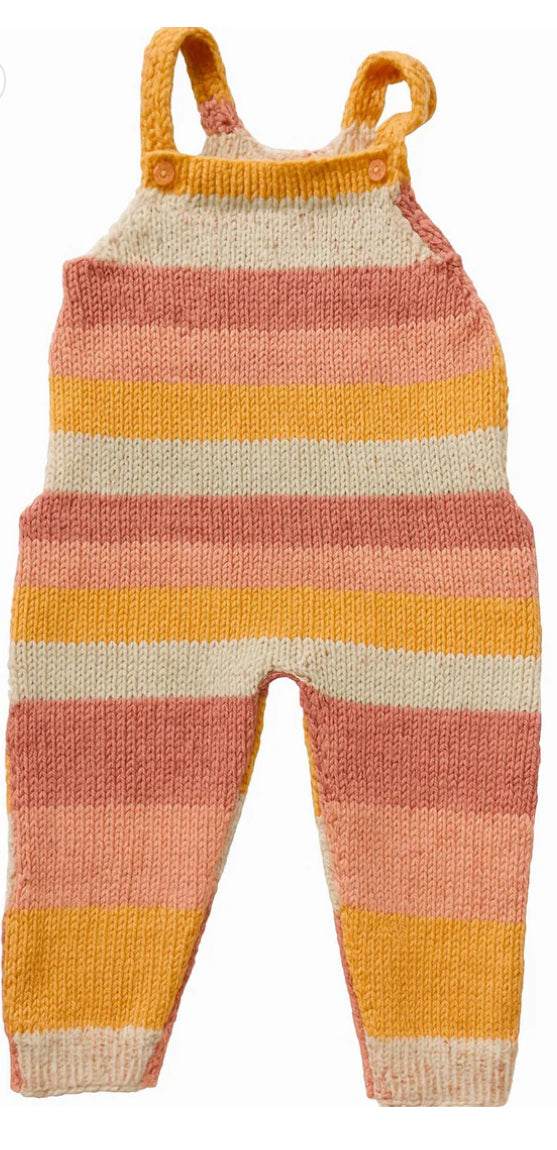 Striped knitted baby dungarees in pastel pink, orange, and beige colors with adjustable straps.
