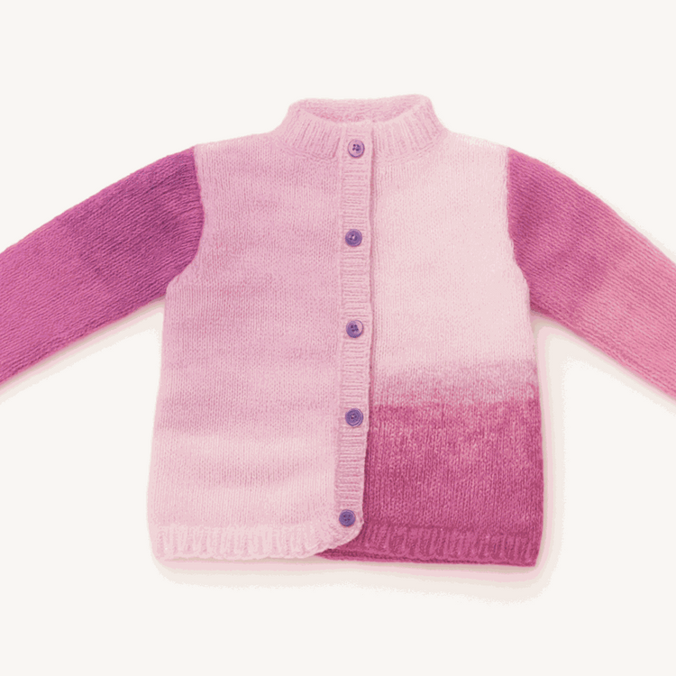 Kinetic cardigan in pink and purple gradient with button front and ribbed collar, combining comfort and modern style.