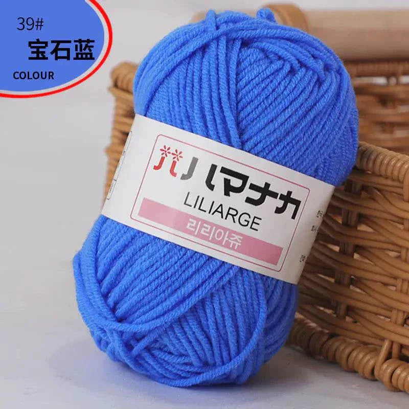 4-ply milk cotton yarn ball in bright blue for baby dolls and crochet projects