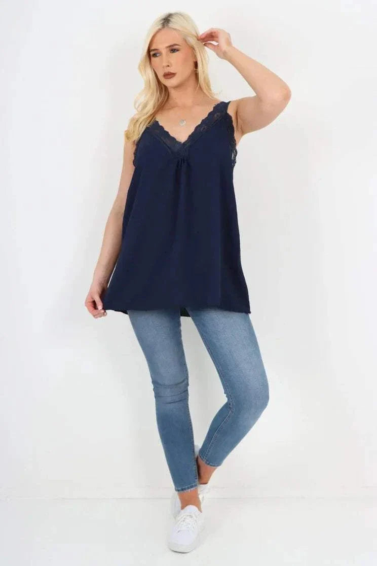 Italian V neck lace detail navy vest top worn with jeans and white sneakers