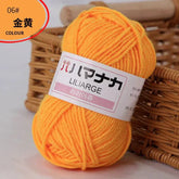 4-ply milk cotton yarn ball in bright orange for baby dolls and crochet projects