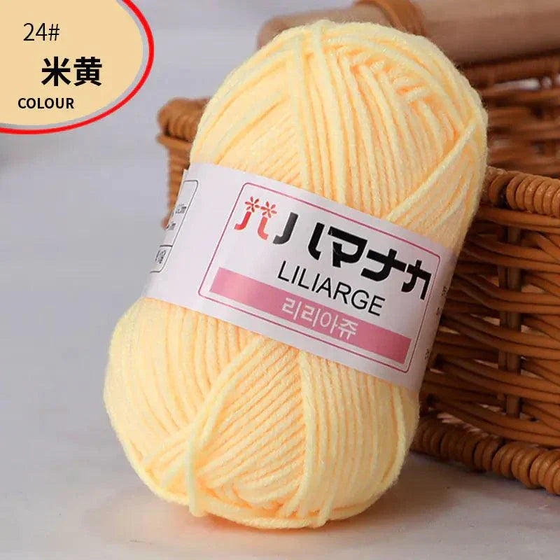 Soft pale yellow 4-ply milk cotton yarn ball for baby dolls and crochet projects