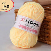 Soft pale yellow 4-ply milk cotton yarn ball for baby dolls and crochet projects