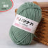 4-ply milk cotton yarn soft green skein for baby dolls and crochet projects