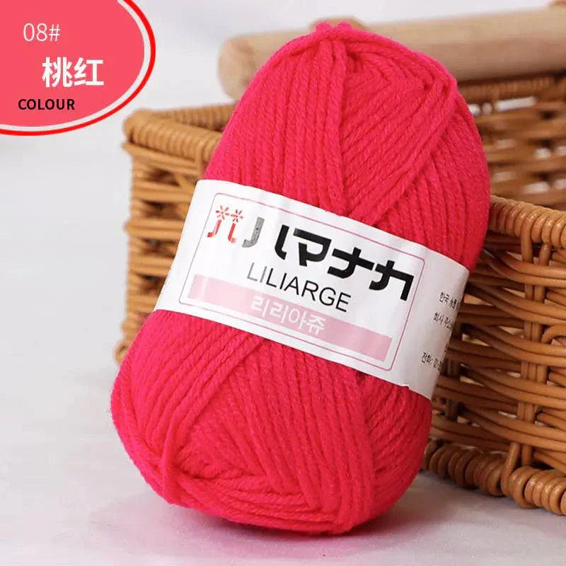 Red 4-ply milk cotton yarn ball for baby dolls and crochet projects