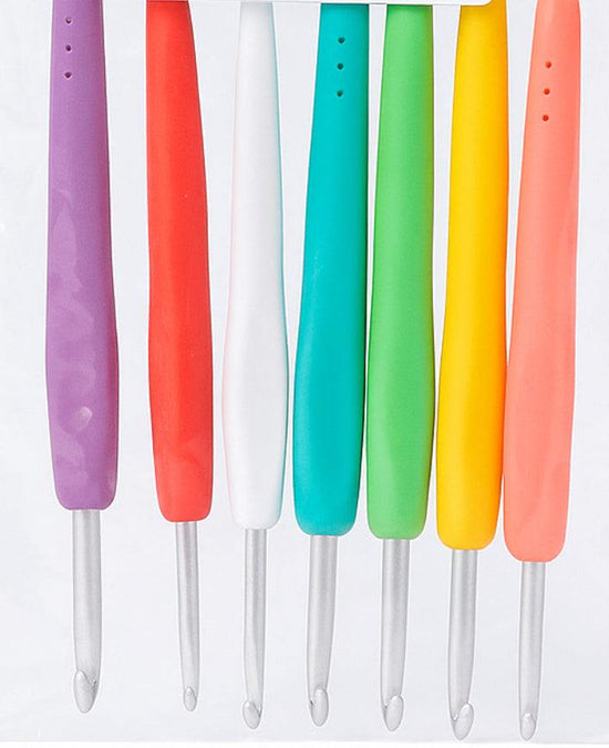 Set of ergonomic crochet hooks with colorful handles for comfortable knitting and crochet projects