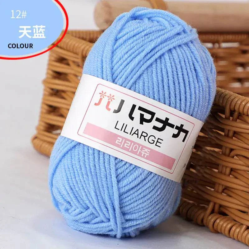 Light blue 4-ply milk cotton yarn ball for baby dolls and crochet projects