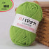 Green 4-ply milk cotton yarn ball for baby dolls and crochet projects