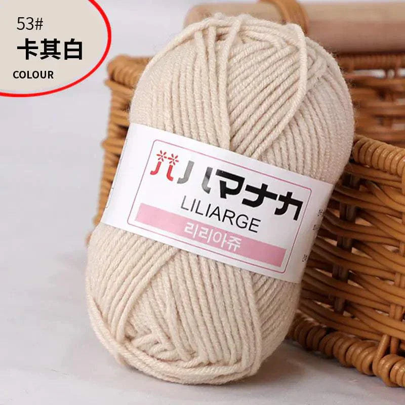 4-ply milk cotton yarn ball in beige color for baby dolls and crochet projects