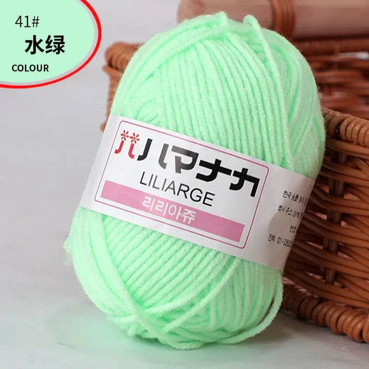 Soft mint green 4-ply milk cotton yarn ball for baby dolls and crochet projects