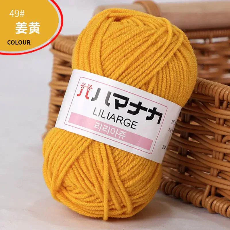 4-ply milk cotton yarn in vibrant yellow for baby dolls and crochet projects