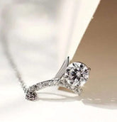 Silver zircon pendant necklace with sparkling crystal centerpiece and elegant design