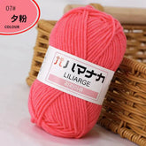 4-ply milk cotton yarn ball in coral pink color for baby dolls and crochet projects