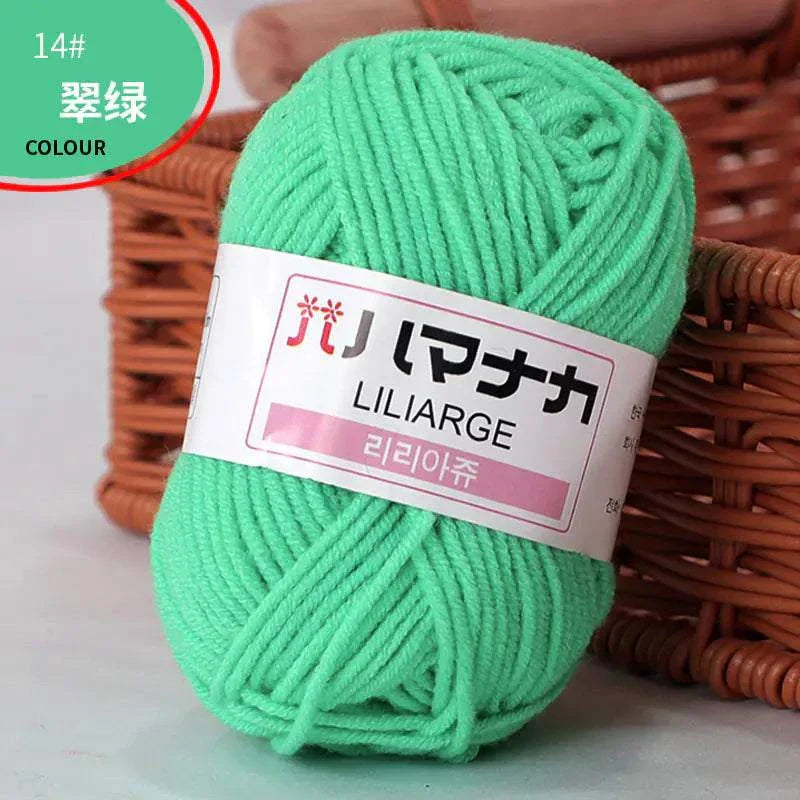 4-ply milk cotton yarn in bright green color ball for baby dolls and crochet projects