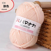 Soft 4-ply milk cotton yarn ball in light peach color for baby dolls and crochet projects
