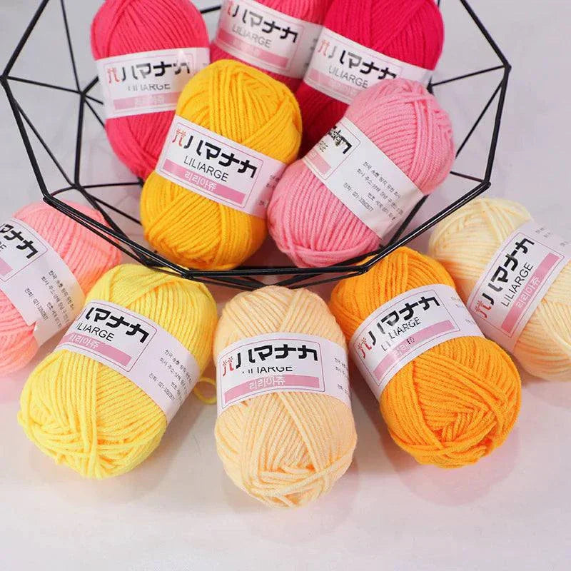Colorful 4-ply Milk Cotton Yarn balls for baby dolls and crochet projects in various soft pastel and bright shades