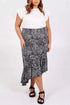 Plus size curve asymmetric hem tiered midi skirt in black and white print