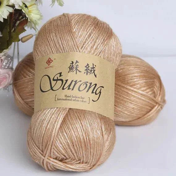 Soft beige yarn balls labeled Surong for DIY knitting scarves and hats