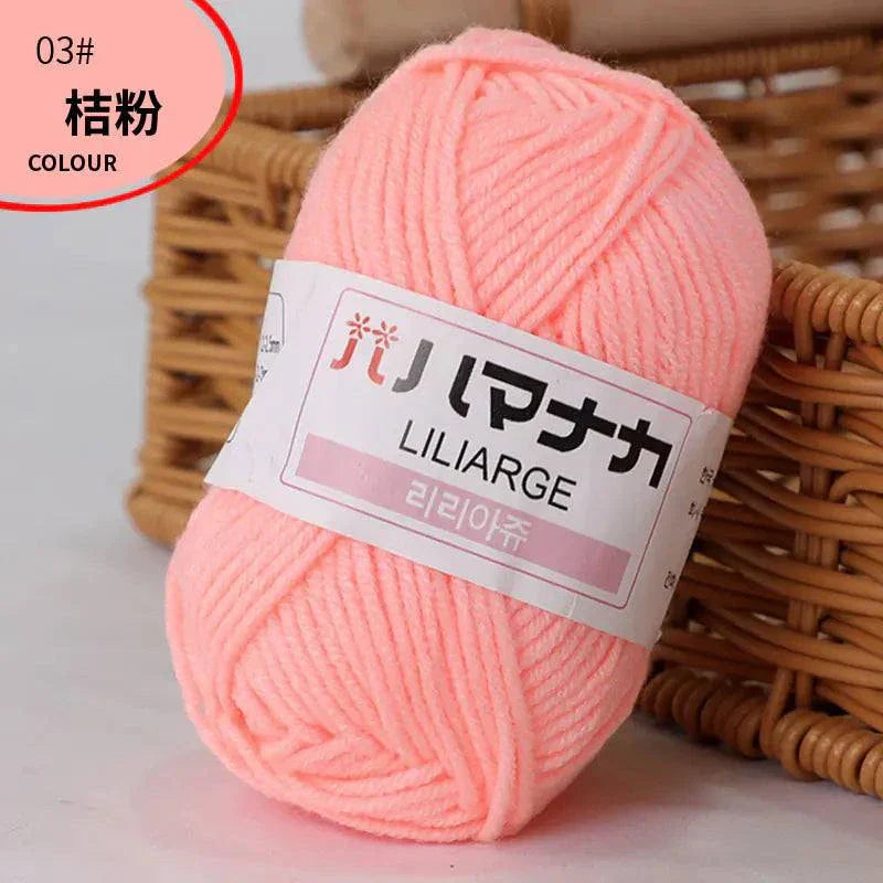 Soft pink 4-ply milk cotton yarn ball for baby dolls and crochet projects
