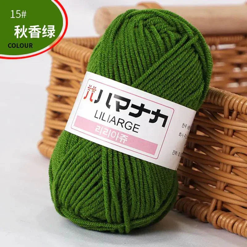 Green 4-ply milk cotton yarn skein for baby dolls and crochet projects