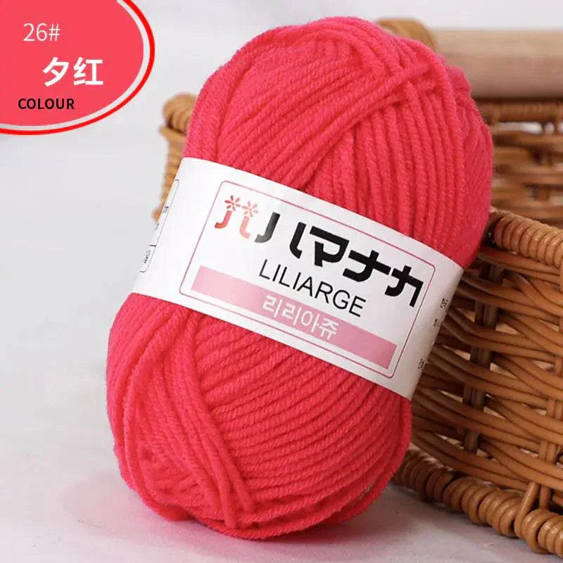 4-ply milk cotton yarn ball in vibrant red color for baby dolls and crochet projects