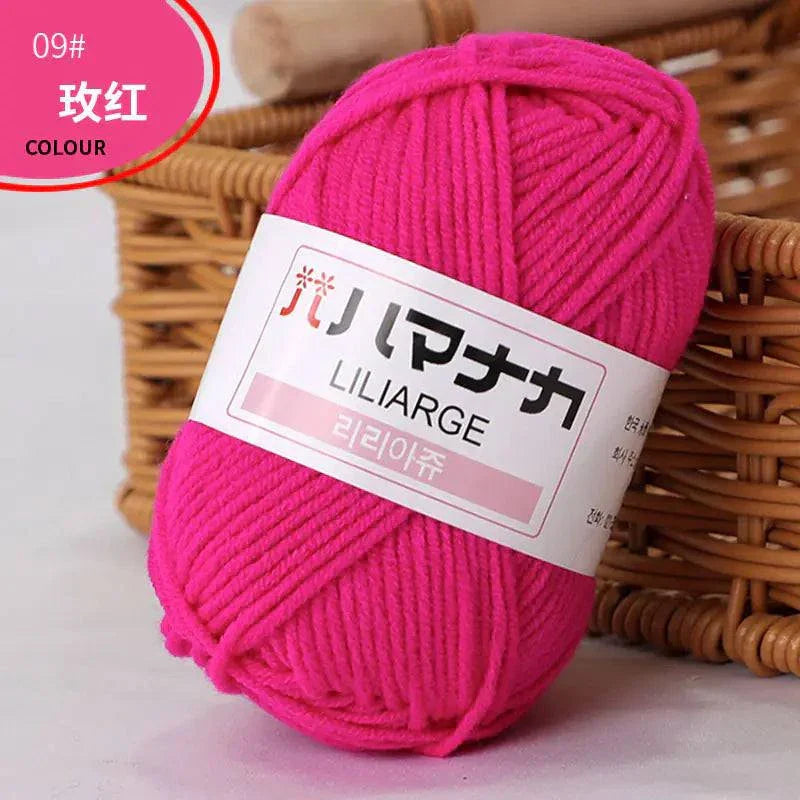 Bright pink 4-ply milk cotton yarn ball for baby dolls and crochet projects