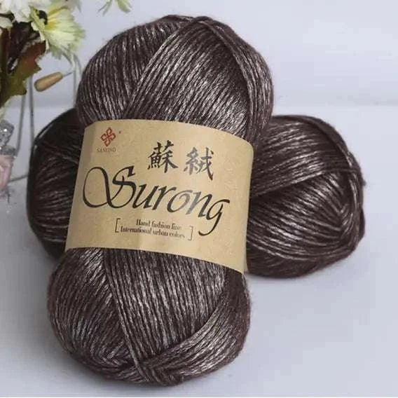 Brown soft yarn balls labeled Surong for DIY knitting scarves and hats