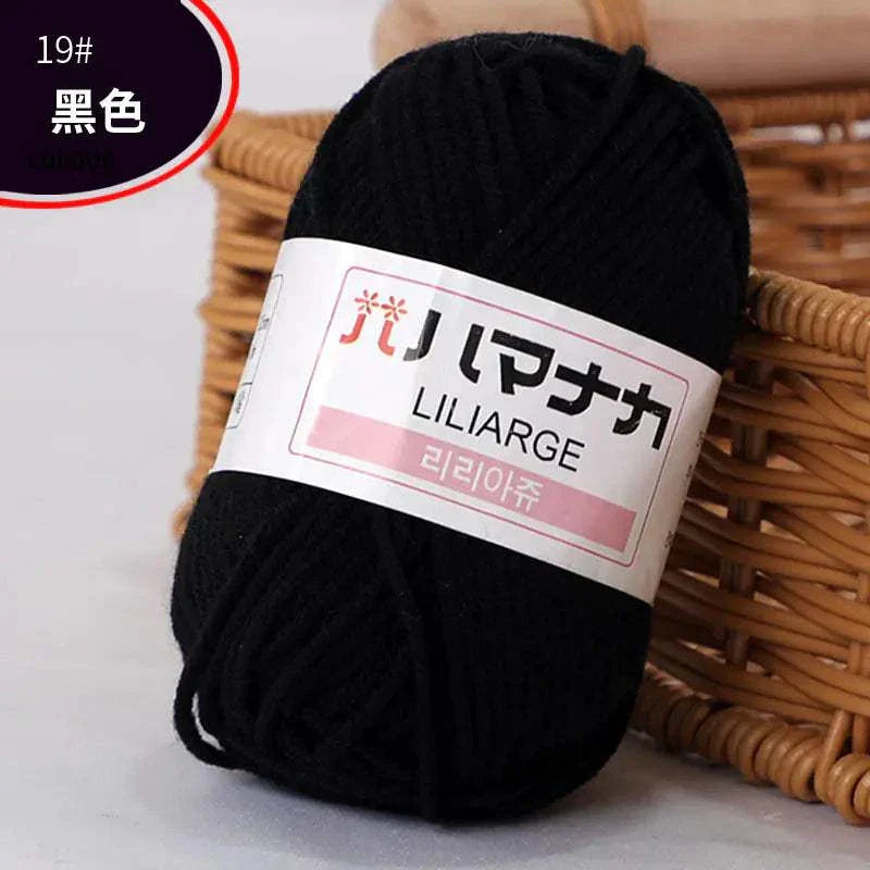 Black 4-ply Milk Cotton Yarn ball for baby dolls and crochet projects