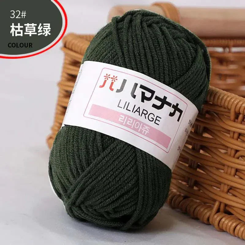 4-ply milk cotton yarn in dark green for baby dolls and crochet projects