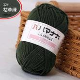4-ply milk cotton yarn in dark green for baby dolls and crochet projects