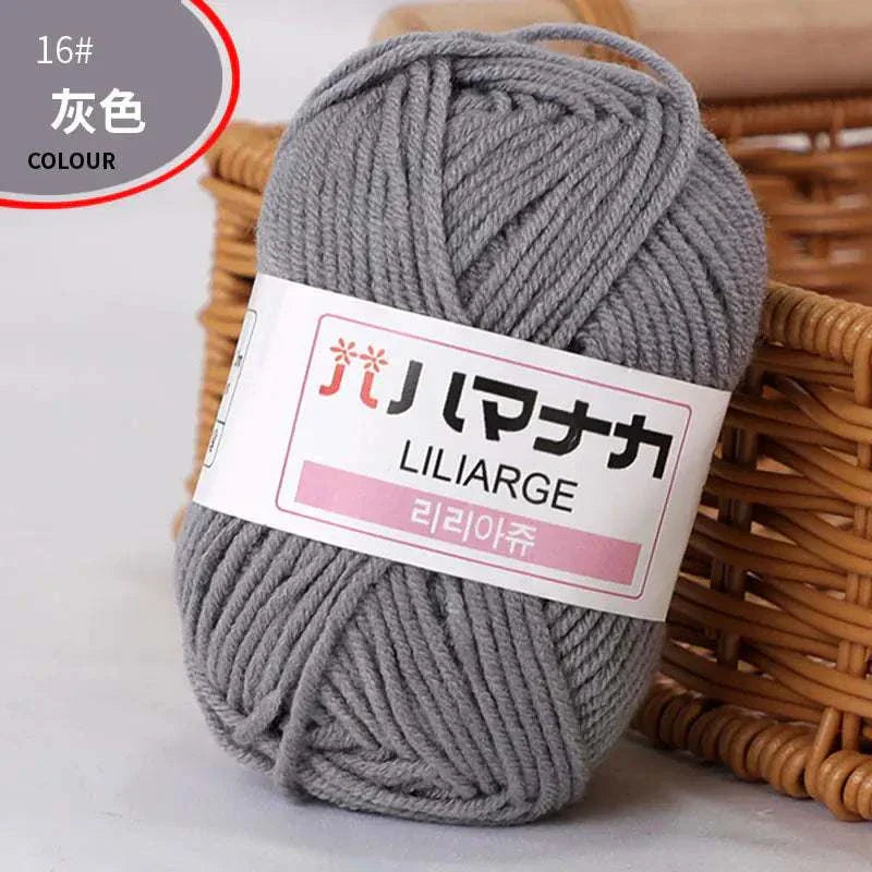 Gray 4-ply milk cotton yarn ball for baby dolls and crochet knitting projects