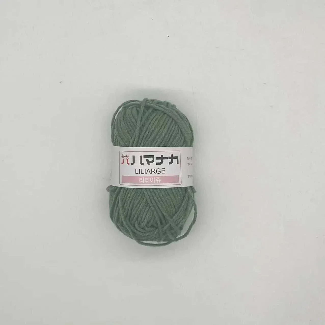 green 4-ply milk cotton yarn ball for baby dolls and crochet with Japanese label