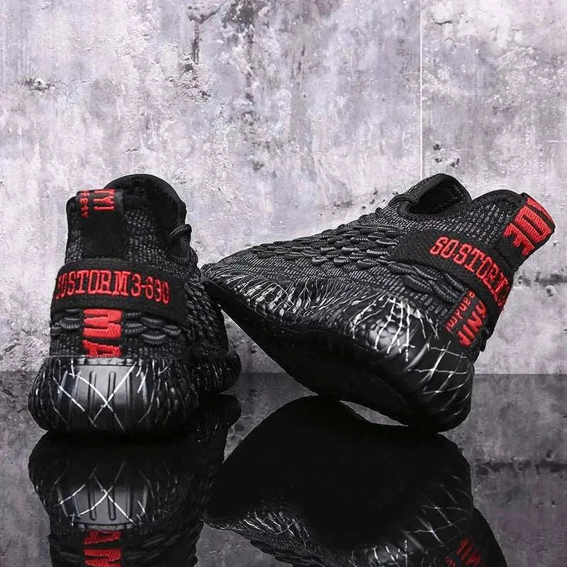 Black sports running shoes with textured design and comfortable sole held in hand