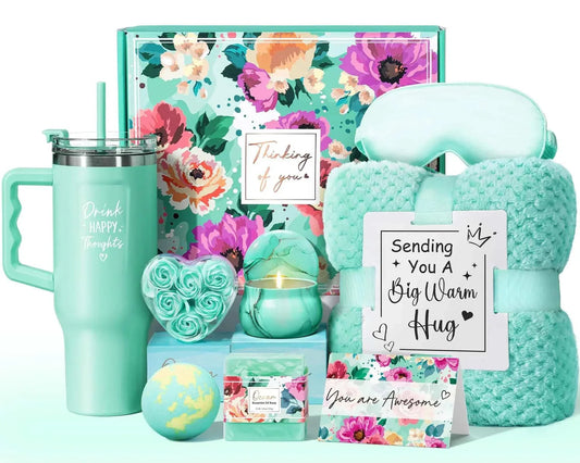 Ocean-themed self care gift basket with luxury flannel blanket, 40oz tumbler, silk eye mask, scented candle, bath bomb, floral soaps, and heartfelt cards